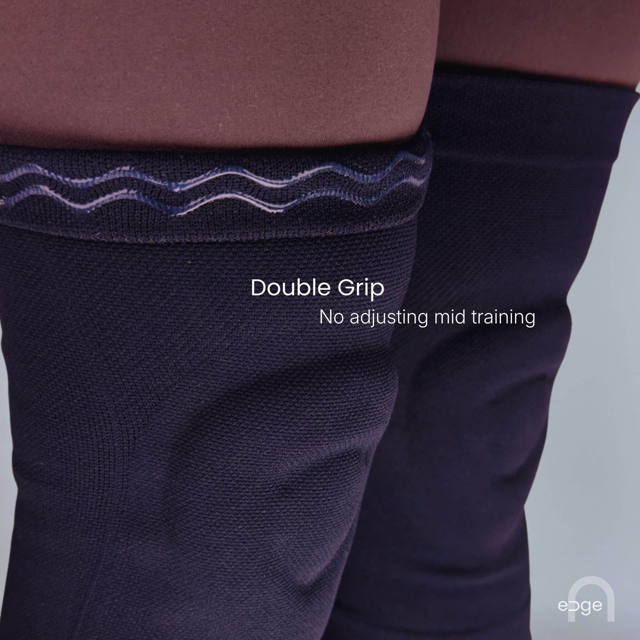 Anti slip silicone grip on black knee pads for ice skaters