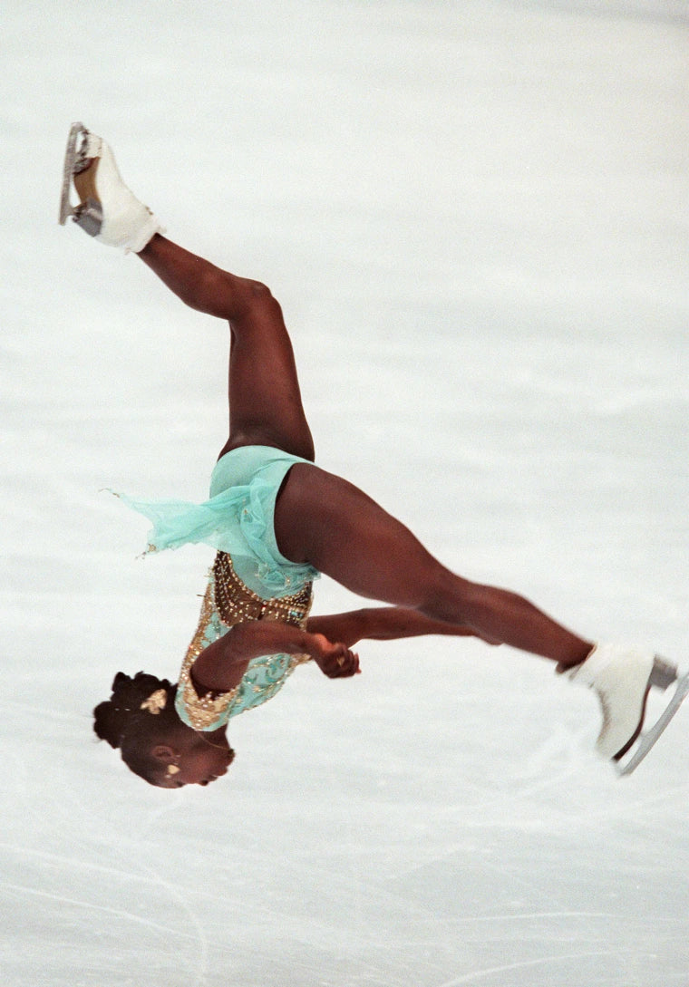 Surya Bonaly first female figure skater to do a backflip on ice during competition