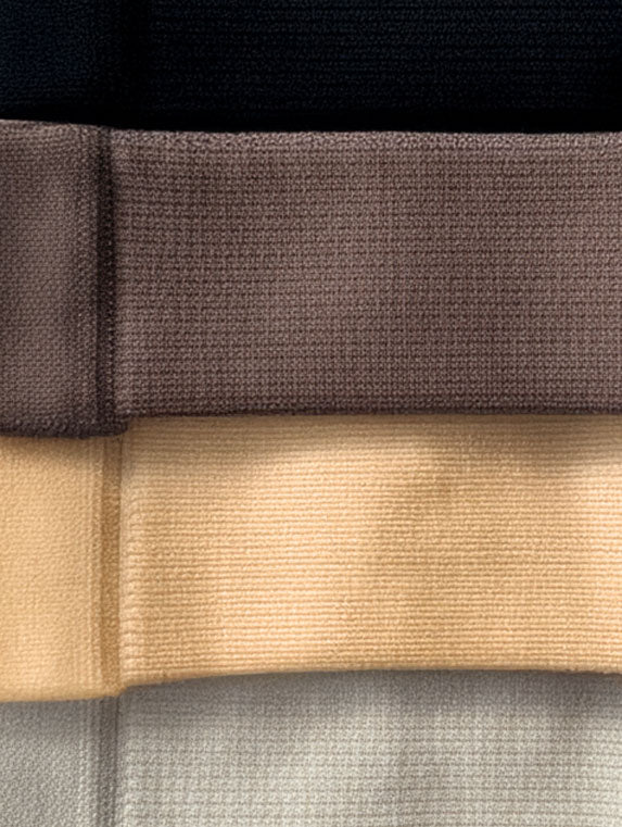 Close-up of brown and beige fabric strips of the edge athletica knee guards