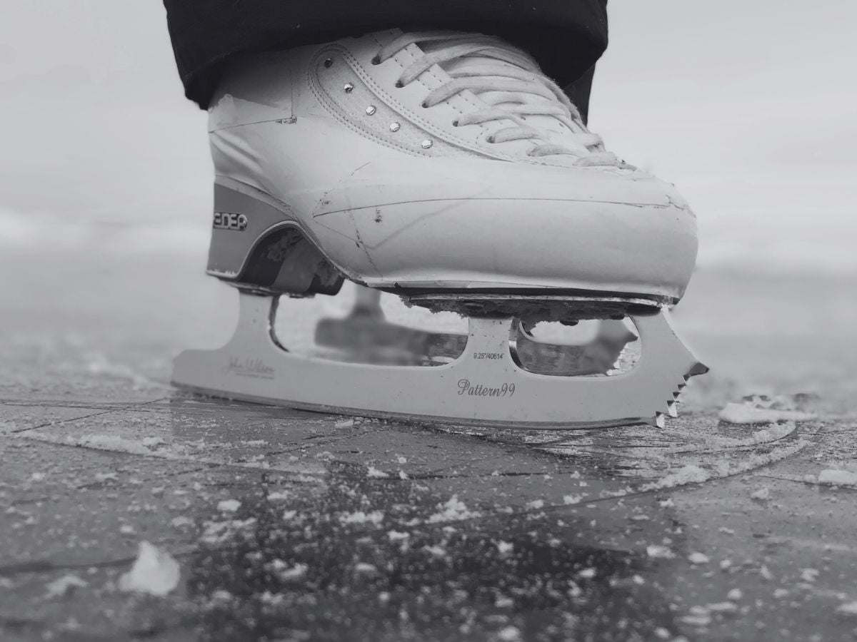 close up of edea figure skate book on nature ice